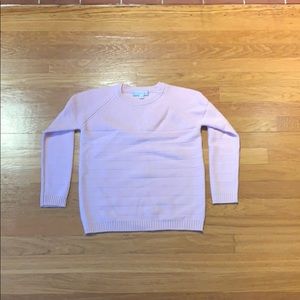 Girl’s cashmere sweater.
